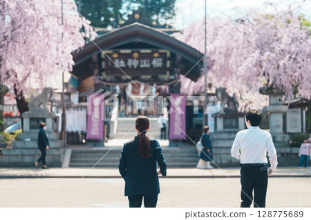 tourists sightseeing Sakurayama Shrine with sakura Cherry blossom in Spring season. Morioka city, Iwate prefecture, Japan. famous Landmark Travel and Vacation destination 128775689