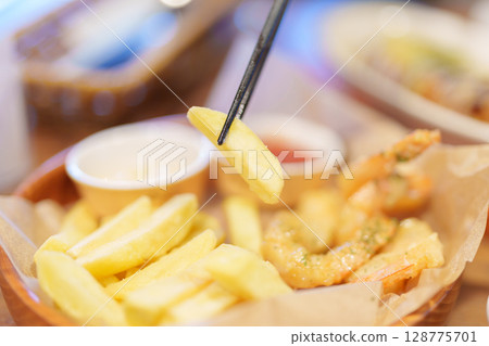 Shrimp Tempura with Vegetable Tempura and french fried on plate 128775701