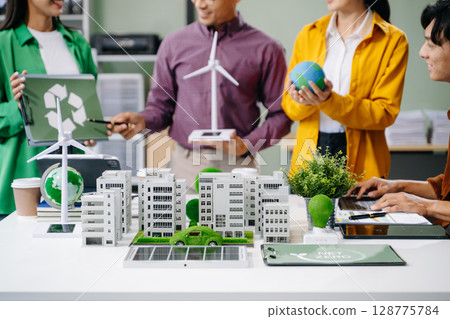 Business team people planning hand using laptop for working technology and business Net zero and carbon neutral concept 128775784