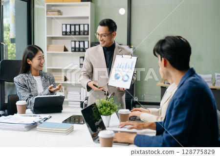 Young business creative team are brainstorming planning discussing while sitting in creative business discussing work 128775829