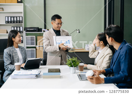 Young business creative team are brainstorming planning discussing while sitting in creative business discussing work 128775830