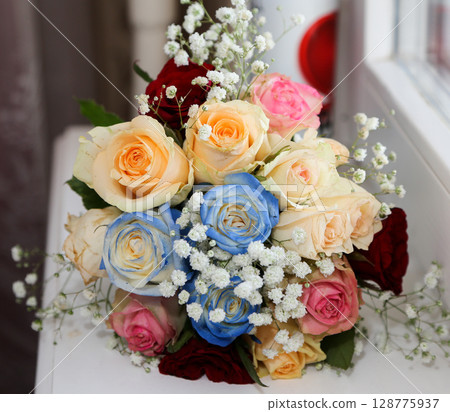 Wedding bouquet with different flowers. Wedding bouquet with different flowers. 128775937