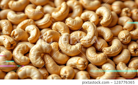 Closeup of cashew nuts showcasing their smooth, creamy texture and natural color, perfect for healthy snacking 128776365
