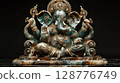 Intricately Carved Ganesh Statue in Vibrant Stone Details 128776749