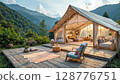 Cozy Outdoor Glamping Tent with Stunning Mountain View at Sunset 128776751