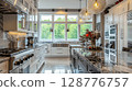 Modern Kitchen with Elegant Design and Natural Light 128776757