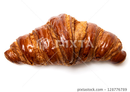 Freshly baked classic delicious fresh organic croissant isolated on white background 128776789