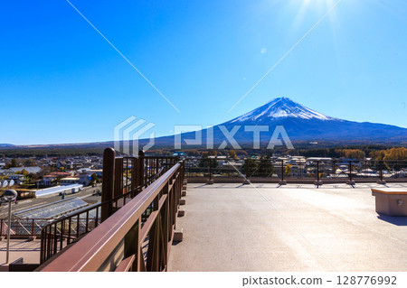 Mount Fuji shining against the autumn sky as seen from the top floor of the Fujisan Deck Observatory 128776992