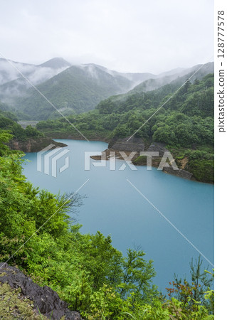 Lake Okushima with its beautiful turquoise blue water Lake Okushima with its beautiful turquoise blue water 128777578