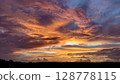 Sunrise sky 128778115