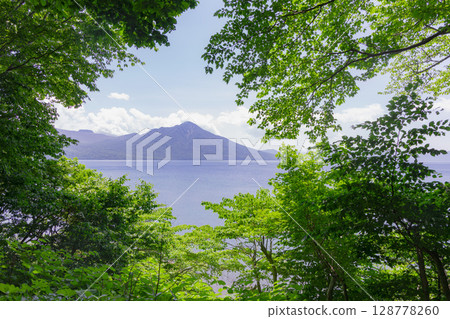 Lake Shikotsu and Mount Fuppushi surrounded by fresh greenery 2 128778260