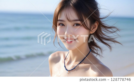 Portrait of a smiling cute girl in a bikini by the beautiful sea Portrait of a smiling cute girl in a bikini by the beautiful sea 128778746