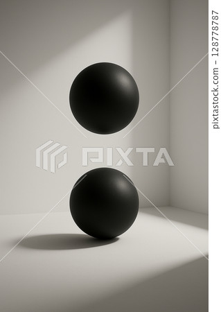 Simple black spheres arranged vertically in a white space Simple black spheres arranged vertically in a white space 128778787
