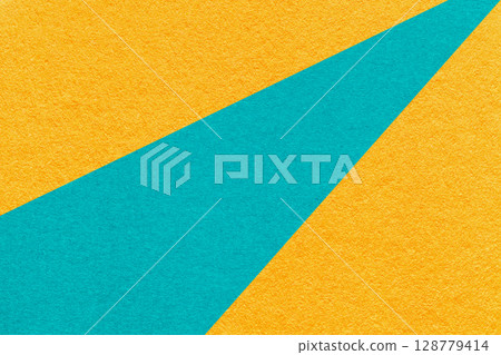 Abstract old yellow paper background with geometric turquoise rays, macro texture for banner, template, presentation Abstract old yellow paper background with geometric turquoise rays, macro texture for banner, template, presentation 128779414