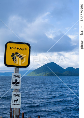 Lake Toya Nakajima and binoculars sign 128779560