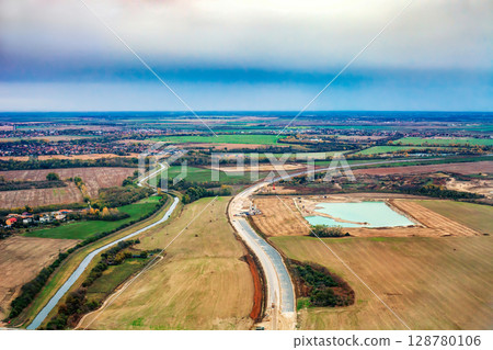 Road under construction in autumn fields near Bratislava in Slovakia, top view 128780106