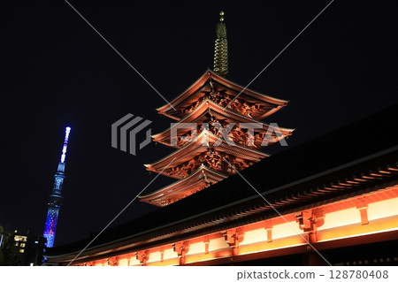 Illuminated five-story pagoda and Tokyo Skytree: Night view of Sensoji Temple 128780408