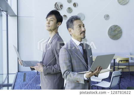 Portrait of two middle-aged businessmen Photo courtesy of Sky Perfect Tokyo Media Center 128781622