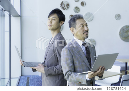 Portrait of two middle-aged businessmen Photo courtesy of Sky Perfect Tokyo Media Center Portrait of two middle-aged businessmen Photo courtesy of Sky Perfect Tokyo Media Center 128781624