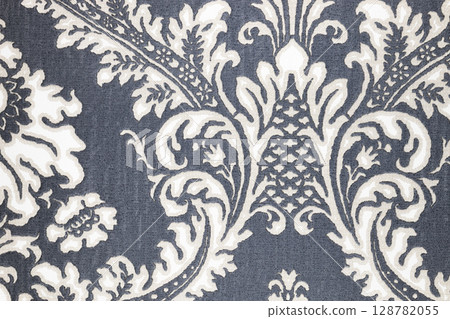 Elegant White Damask on Charcoal Grey. Vintage Baroque Floral Wallpaper Pattern Background Elegant White Damask on Charcoal Grey. Vintage Baroque Floral Wallpaper Pattern Background 128782055