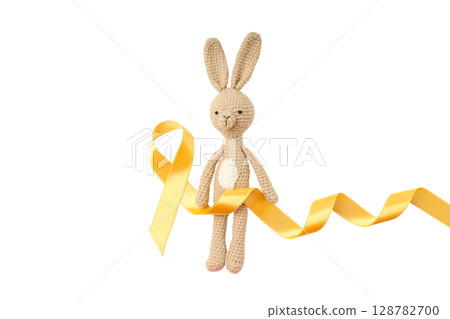 Bunny with yellow ribbon symbolizes support, isolated on white, PNG 128782700