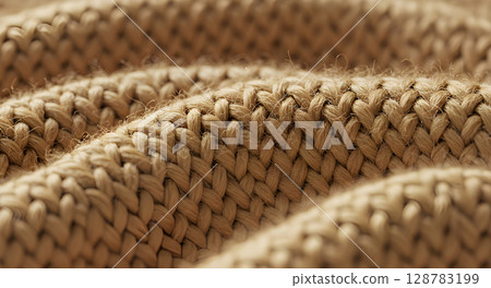 close up of knitted wool on woven mat 128783199