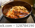 Grilled eel and beef bowl 128784190