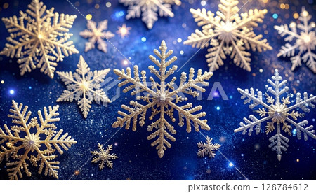 A festive blue Christmas and New Year background with a pattern of decorative snowflakes and stars A festive blue Christmas and New Year background with a pattern of decorative snowflakes and stars 128784612