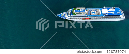 Aerial view cruise ship liner on ocean sea, Luxury cruise ship liner modern maritime travel lifestyle ocean sea, Cruise ship liner exclusive tourism travel on holiday take vacation time. 128785074