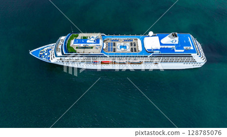 Aerial view cruise ship liner on ocean sea, Luxury cruise ship liner modern maritime travel lifestyle ocean sea, Cruise ship liner exclusive tourism travel on holiday take vacation time. 128785076