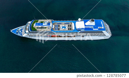 Aerial view cruise ship liner on ocean sea, Luxury cruise ship liner modern maritime travel lifestyle ocean sea, Cruise ship liner exclusive tourism travel on holiday take vacation time. 128785077