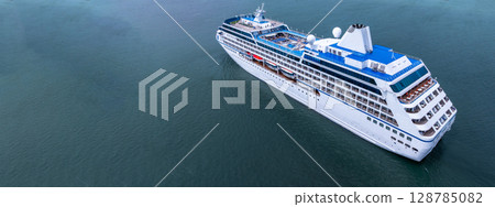 Aerial view cruise ship liner on ocean sea, Luxury cruise ship liner modern maritime travel lifestyle ocean sea, Cruise ship liner exclusive tourism travel on holiday take vacation time. 128785082