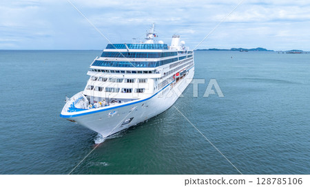 Aerial view cruise ship liner on ocean sea, Luxury cruise ship liner modern maritime travel lifestyle ocean sea, Cruise ship liner exclusive tourism travel on holiday take vacation time. 128785106