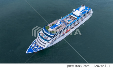 Aerial view cruise ship liner on ocean sea, Luxury cruise ship liner modern maritime travel lifestyle ocean sea, Cruise ship liner exclusive tourism travel on holiday take vacation time. 128785107