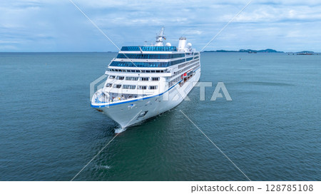 Aerial view cruise ship liner on ocean sea, Luxury cruise ship liner modern maritime travel lifestyle ocean sea, Cruise ship liner exclusive tourism travel on holiday take vacation time. 128785108