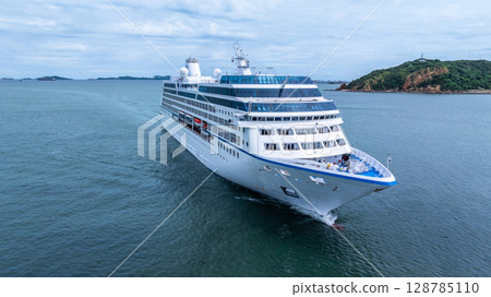 Aerial view cruise ship liner on ocean sea, Luxury cruise ship liner modern maritime travel lifestyle ocean sea, Cruise ship liner exclusive tourism travel on holiday take vacation time. 128785110