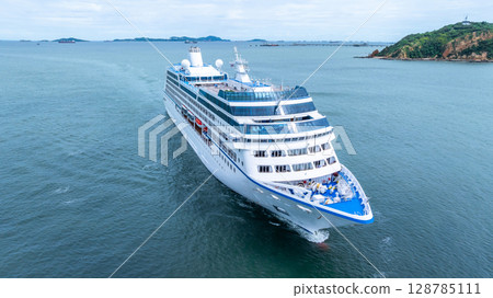 Aerial view cruise ship liner on ocean sea, Luxury cruise ship liner modern maritime travel lifestyle ocean sea, Cruise ship liner exclusive tourism travel on holiday take vacation time. 128785111