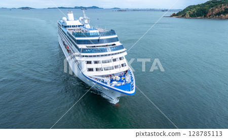 Aerial view cruise ship liner on ocean sea, Luxury cruise ship liner modern maritime travel lifestyle ocean sea, Cruise ship liner exclusive tourism travel on holiday take vacation time. 128785113