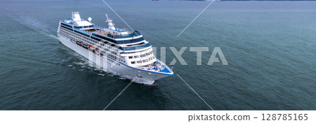 Aerial view cruise ship liner on ocean sea, Luxury cruise ship liner modern maritime travel lifestyle ocean sea, Cruise ship liner exclusive tourism travel on holiday take vacation time. 128785165