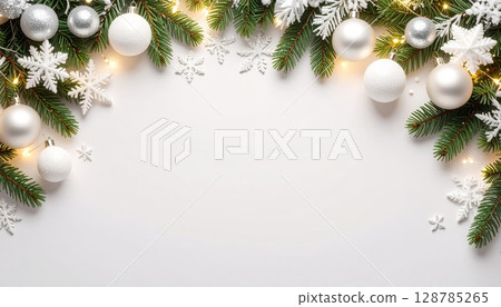 Snow-dusted evergreen branches create a festive Christmas background Snow-dusted evergreen branches create a festive Christmas background 128785265