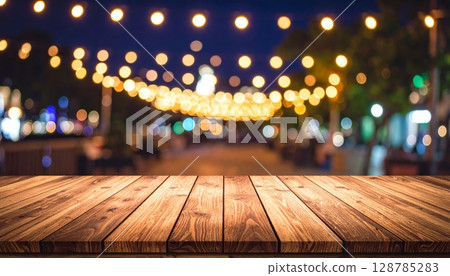 Warm wooden interior of an empty room with abstract light bokeh and blurred city lights outside Warm wooden interior of an empty room with abstract light bokeh and blurred city lights outside 128785283