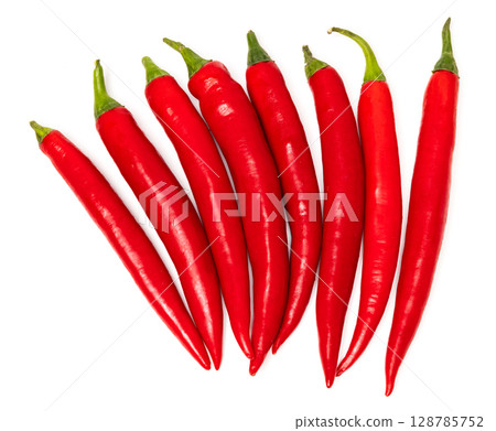 Bunch of red natural organic chili pepper pods isolated on white background 128785752
