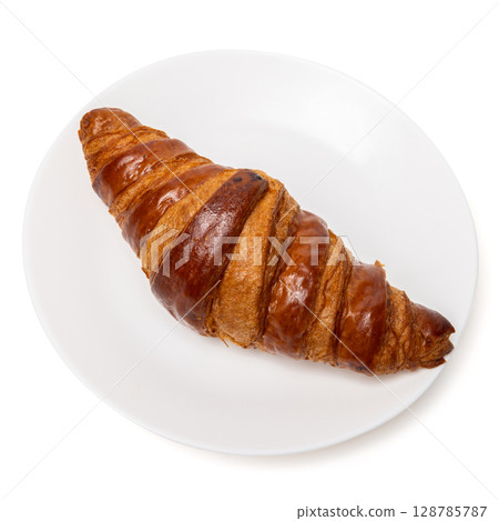 Freshly baked classic delicious fresh organic croissant on white ceramic plate isolated on white background 128785787
