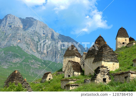 Dargavs, North Ossetia-Alania, Russia. City of the dead, ancient necropolis in the mountains of North Caucasus. 128786450