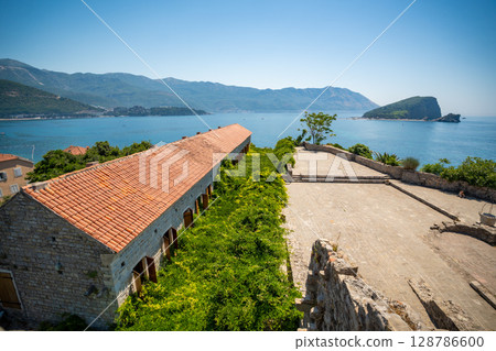 Citadel fortress and panoramic terrace in Budva, Montenegro. View of historic architecture and coastal heritage site. Citadel fortress and panoramic terrace in Budva, Montenegro. View of historic architecture and coastal heritage site. 128786600