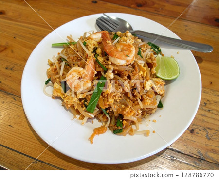 Pad thai in a bowl on the table Thai food 128786770