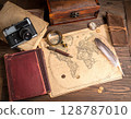 Old camera and old map 128787010