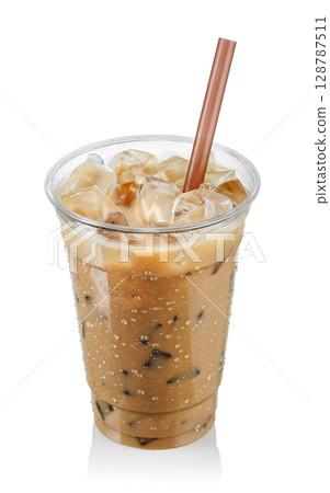 Iced coffee with milk in fogged disposable plastic cup with straw isolated on white background 128787511
