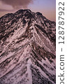 Climbing trail at sunset 128787922