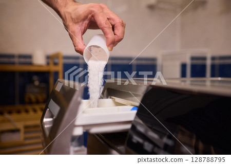 To achieve cleaner clothes, adding the right type of detergent to your washing machine is essential 128788795